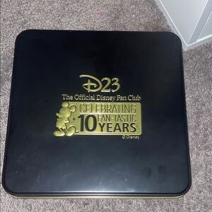 Disney D23 Black and Gold Commemorative Tin